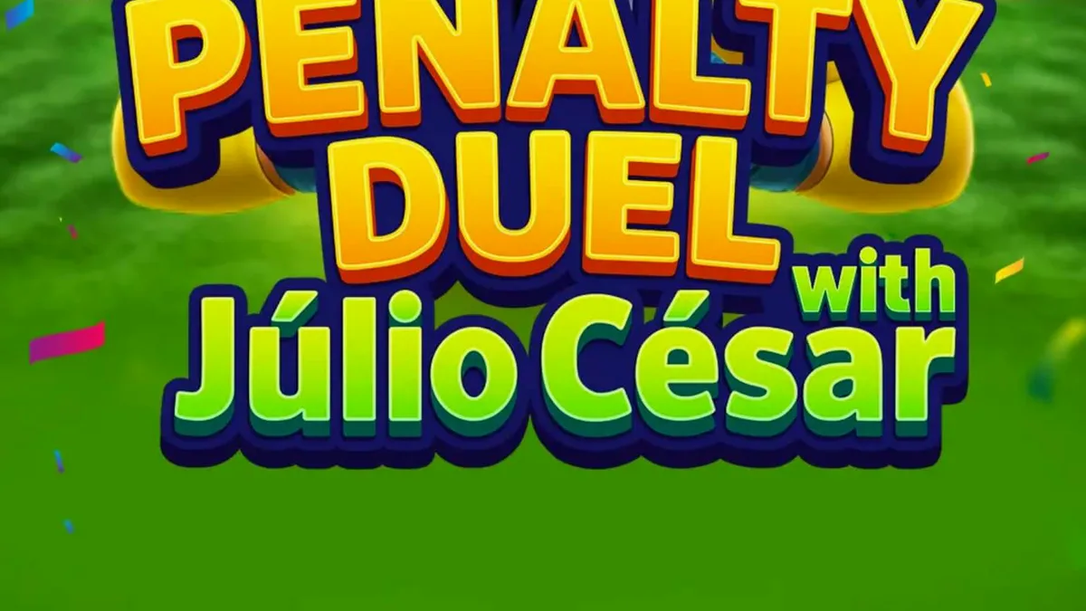 Pemain bersiap melakukan tendangan penalti melawan Júlio César di lapangan stadion.
